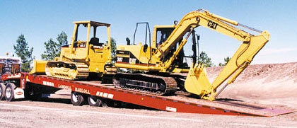 This hydraulic tilt trailer is designed for easy loading and unloading of large equipment.