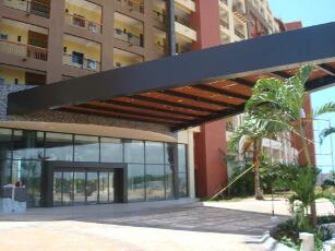 Entrada Hotel Villa Palmar panel de aluminio ALPOLIC JBR