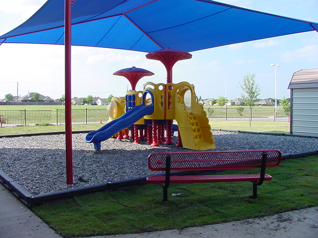 commercial playground structure using soft rubber mulch