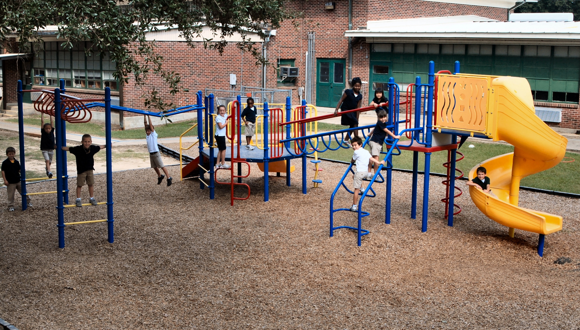 commercial playground structure using soft rubber mulch for daycare facilities