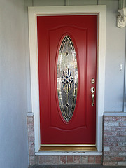 Red Fiberglass Door with Oval Glass Insert