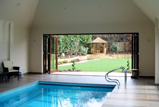 Bi-folding door for swiming pool area