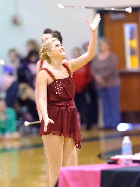 I Lindsey McCormick twirls during the Mickey's Majorette Small Beginner Dance Twirl team performance at the Dallas Twirling contest.mage description